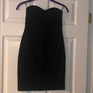 Little black strapless dress with bandage pattern